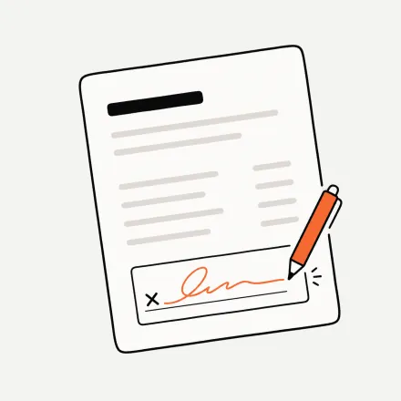 A document signed by hand in its signature box, with a pen resting beside it
